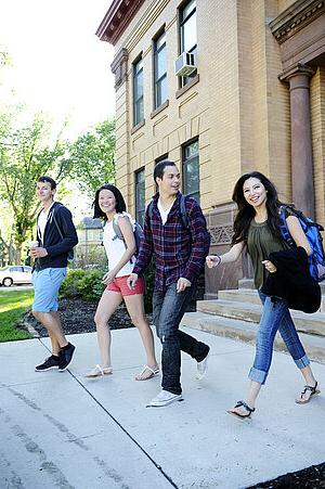 Photo of 4 NDSU Students Exiting Building